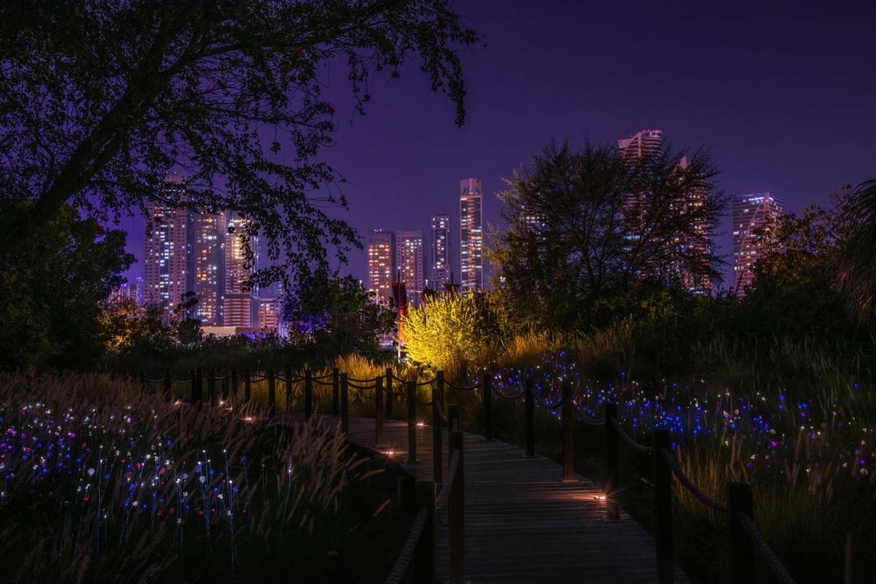 The Chedi Al Bait, Sharjah Hotel Exterior photo The Myriad Gardens at night